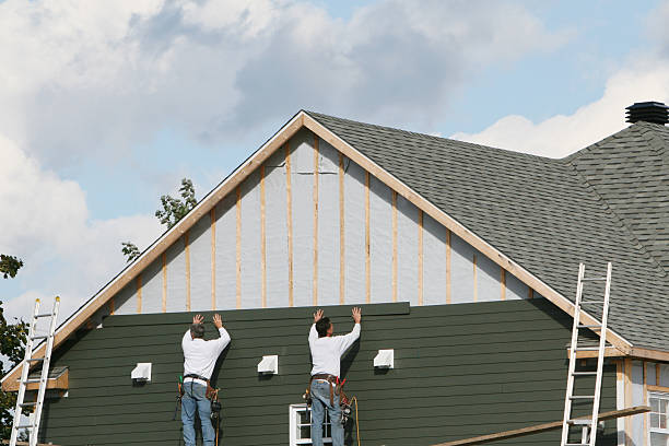 Professional Storm Damage Siding Repair technician working in Mooresville, NC